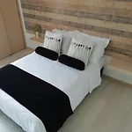 Apartasuite Laureles Cmc
